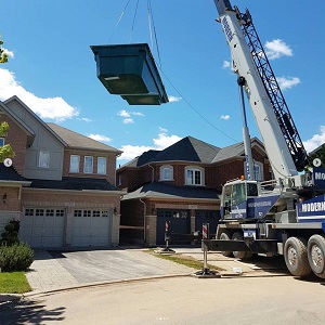 Craning a Fiberglass Pool Above a House